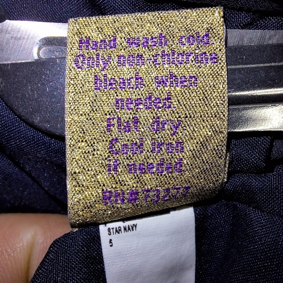 A Vera Wang Princess Star Navy dress with a sheer collar in a girl's size 5. - Picture 5 of 5